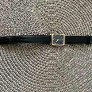 Elegant Black and Gold Women's Watch